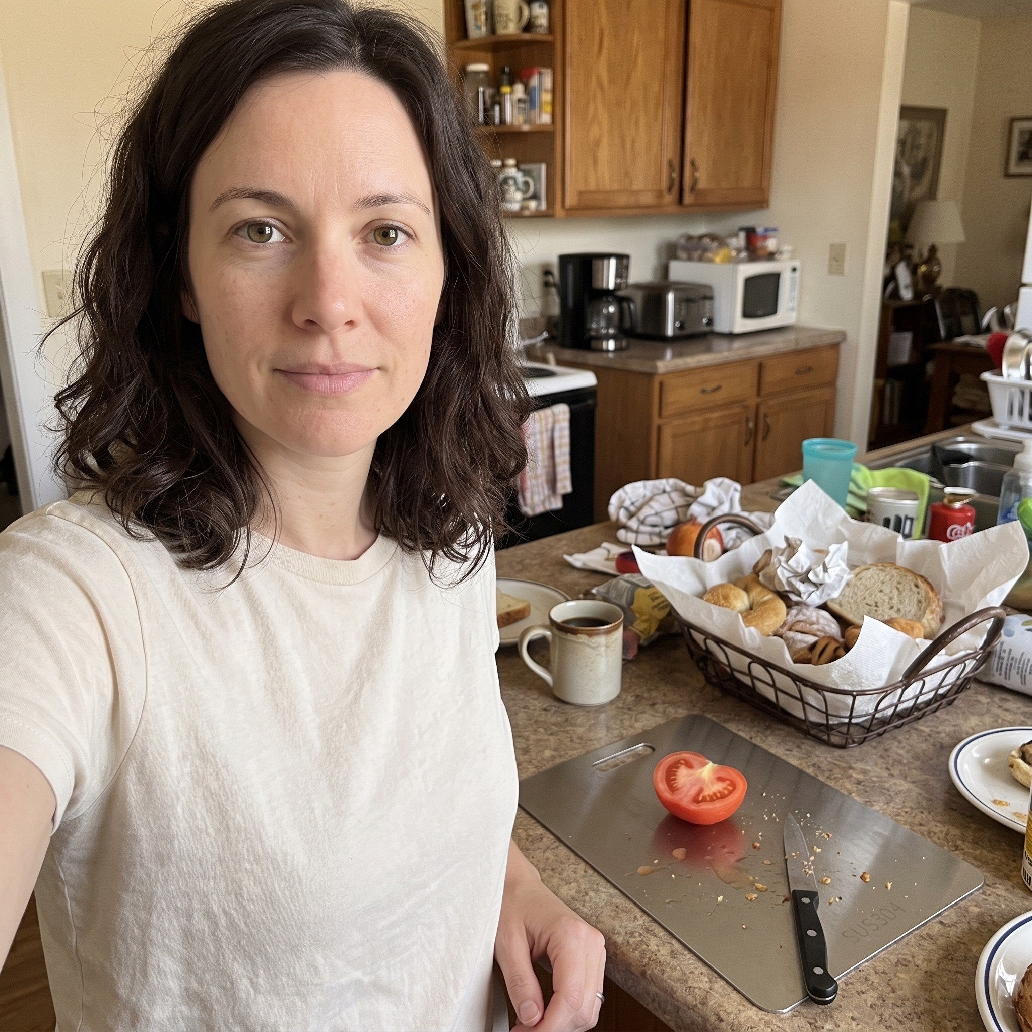 Emma taking a kitchen selfie after tomato prep